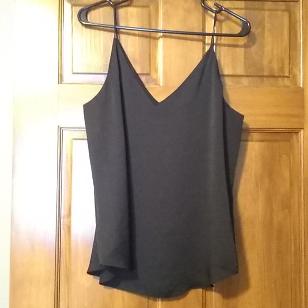 Express cami size large black has a bit of shimmer to it